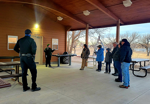 Volunteers listen to a park ranger during the 2022 Bald Eagle Survey at John Martin Reservoir, Jan. 8, 2022.